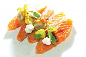 Citrus Cured Norwegian Salmon (cherry tomatoes, pickled onions, baby arugula, and smoked goat cheese).
