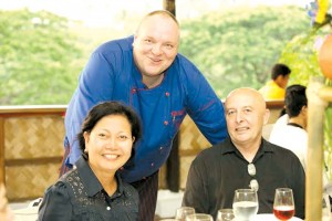Marriott’s executive chef Meik Brammer (standing) and the husband and wife team of Craig and Corazon Bautista (seated).